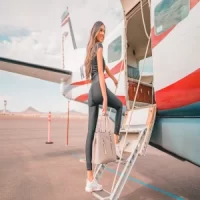 Girl boarding plane to enjoy flying-200-200 POST