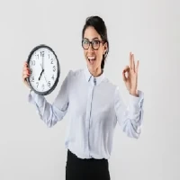 being on time-200-200 Woman on time by holding clock making OK sign with hand