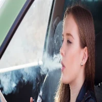 Stop Vaping Hypnosis-200-200 Young woman vaping in car